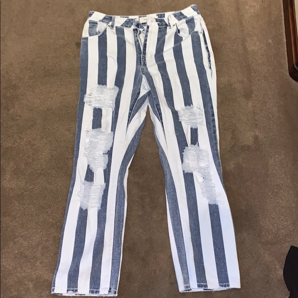 Blue and white striped ripped jeans